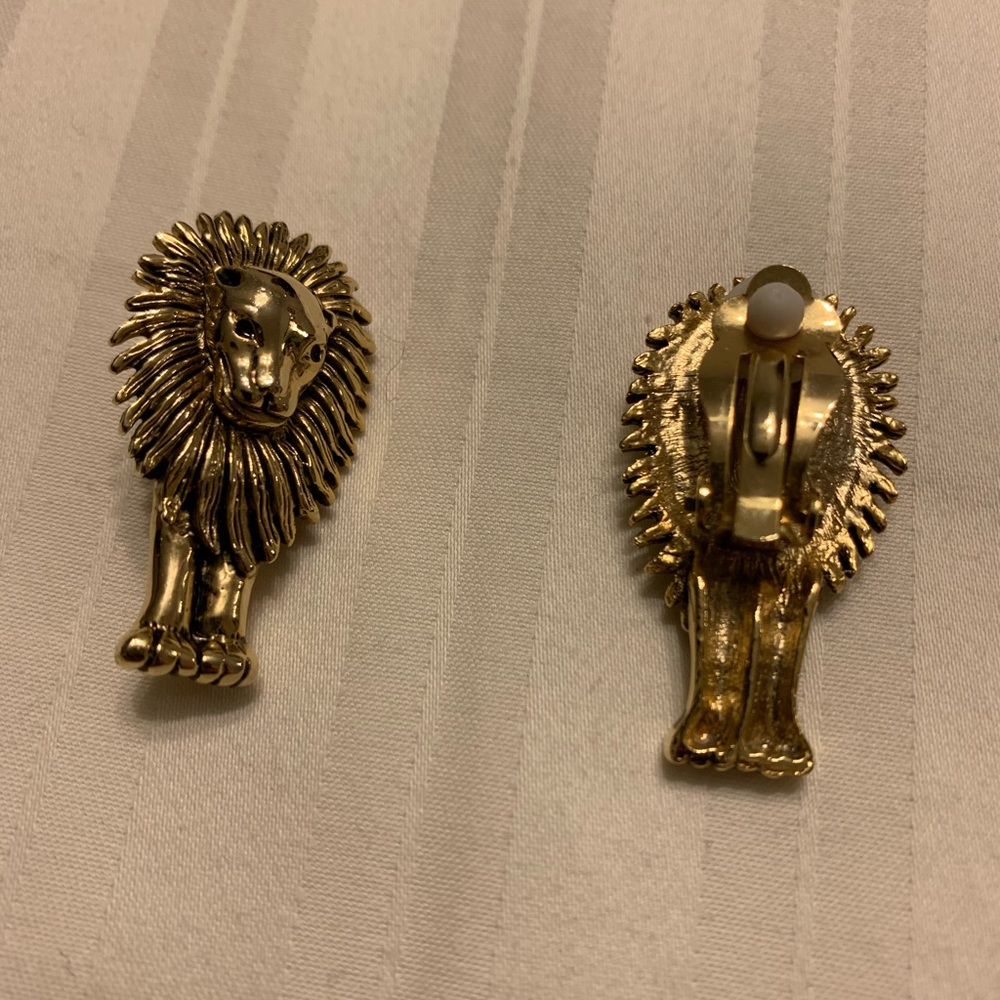 Two sets of vintage gold clip earrings.